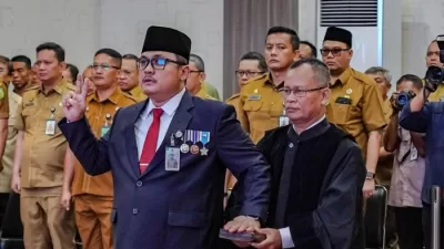 Foto: Topan Ginting saat diambil sumpah jabatan sebagai Pj Sekda Kota Medan. (Dok. Diskominfo Medan)